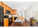 Updated kitchen featuring hardwood floors and stainless steel appliances at 7753 Winners Edge St, Raleigh, NC 27617