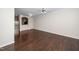 Spacious living room showcasing hardwood floors, crown molding, and neutral paint at 7753 Winners Edge St, Raleigh, NC 27617