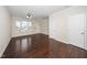 Bright living room boasting hardwood floors, crown molding, and natural light at 7753 Winners Edge St, Raleigh, NC 27617