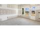 Bedroom features three large windows providing natural light and views of the outdoors at 9000 Penny Rd, Raleigh, NC 27606