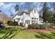 Backyard with patio seating and well manicured lawn at 9700 Pentland Ct, Raleigh, NC 27614