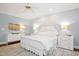 Light-filled bedroom features a plush carpet, white furniture, and ceiling fan at 9700 Pentland Ct, Raleigh, NC 27614