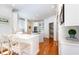 Bright kitchen featuring white cabinets and stainless steel appliances at 9700 Pentland Ct, Raleigh, NC 27614