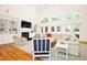 Open living area with high ceilings, built-ins, fireplace, and hardwood flooring at 9700 Pentland Ct, Raleigh, NC 27614