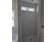 New shower features white tile and a window for natural light at 1039 N Lincoln St, Benson, NC 27504