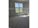 A bright bedroom with a double window that brings in plenty of natural light at 1039 N Lincoln St, Benson, NC 27504