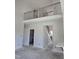 Unfinished interior featuring a natural wood and black rod iron stairway with a railing at 1039 N Lincoln St, Benson, NC 27504