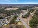 Aerial view of neighborhood with mature landscaping and lush trees at 105 Byron Ct, Oxford, NC 27565