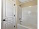 A bathroom showing a tub and shower combination with a white shower curtain at 105 Byron Ct, Oxford, NC 27565