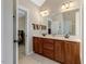 Bathroom with double vanity, tile flooring and granite countertops at 105 Byron Ct, Oxford, NC 27565
