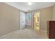 Neutral bedroom featuring carpet flooring, a closet, and plenty of natural light at 105 Byron Ct, Oxford, NC 27565