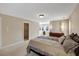 Spacious bedroom features carpet, neutral colors, and large windows offering plenty of natural light at 105 Byron Ct, Oxford, NC 27565