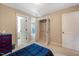 Comfortable bedroom featuring neutral walls, carpet floors, and a spacious closet at 105 Byron Ct, Oxford, NC 27565