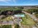 Beautiful aerial view of community pool featuring water slide and lounge area at 105 Byron Ct, Oxford, NC 27565