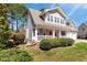 Attractive two-story home featuring a welcoming front porch and a two-car garage at 105 Byron Ct, Oxford, NC 27565
