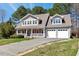 Attractive two-story home with a delightful front porch and an attached two-car garage at 105 Byron Ct, Oxford, NC 27565