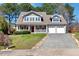 Beautiful two-story home with a cozy front porch and a convenient two-car garage at 105 Byron Ct, Oxford, NC 27565