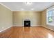 Bright and spacious living room with fireplace and hardwood flooring at 105 Byron Ct, Oxford, NC 27565