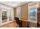 Bright office space with natural light, hardwood floors, and french doors at 105 Byron Ct, Oxford, NC 27565