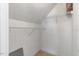 Unfurnished walk-in closet featuring a wire shelving system and carpeted floor at 105 Byron Ct, Oxford, NC 27565