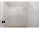 Empty walk-in closet, painted white, with wire shelving, and carpeted floor at 105 Byron Ct, Oxford, NC 27565