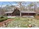 Spacious backyard with stone accents and a deck perfect for outdoor entertaining at 10729 Trego Trl, Raleigh, NC 27614
