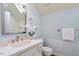 Bathroom features a stylish vanity, a framed mirror, and a tiled shower at 10729 Trego Trl, Raleigh, NC 27614