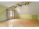 Spacious bedroom with hardwood floors, a large window, and ample natural light at 10729 Trego Trl, Raleigh, NC 27614