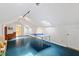 Attic bonus room with skylights and a ping pong table at 10729 Trego Trl, Raleigh, NC 27614