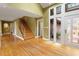 Inviting foyer with hardwood floors, stairs, and abundant natural light at 10729 Trego Trl, Raleigh, NC 27614