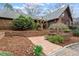 Charming home featuring brick accents and a landscaped front yard at 10729 Trego Trl, Raleigh, NC 27614