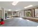 Spacious garage with storage cabinets and a view of surrounding landscape at 10729 Trego Trl, Raleigh, NC 27614