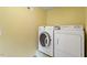 Laundry room with a modern washer and dryer at 10729 Trego Trl, Raleigh, NC 27614