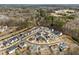 Aerial view showcases a residential neighborhood with manicured lawns and tree-lined streets; highlighting the sense of community at 110 Jacoby Way, Chapel Hill, NC 27516