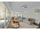 Open-concept living room and kitchen boasts a spacious layout, modern design, and access to the screened-in porch at 110 Jacoby Way, Chapel Hill, NC 27516