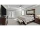 Serene main bedroom with tray ceiling, French doors, and a spacious layout for a relaxing retreat at 110 Jacoby Way, Chapel Hill, NC 27516