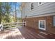 Spacious wooden deck offering outdoor enjoyment and views of the natural surroundings at 112 Celeste Cir, Chapel Hill, NC 27517