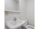 Clean bathroom showcasing a white sink, toilet, and chrome faucet at 112 Celeste Cir, Chapel Hill, NC 27517
