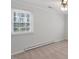 Bedroom featuring neutral walls, carpet, window, and ceiling fan at 112 Celeste Cir, Chapel Hill, NC 27517
