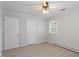Bedroom featuring neutral walls, carpet, closet, and a bright window at 112 Celeste Cir, Chapel Hill, NC 27517
