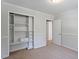 Bedroom with built in shelves and closet space at 112 Celeste Cir, Chapel Hill, NC 27517