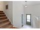 Welcoming foyer features stairs and a decorative front door at 112 Celeste Cir, Chapel Hill, NC 27517