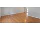 Open living room features hardwood floors and neutral paint for a bright, airy feel at 112 Celeste Cir, Chapel Hill, NC 27517