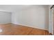 Bright living room featuring hardwood floors and neutral wall paint at 112 Celeste Cir, Chapel Hill, NC 27517