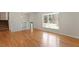 Bright living area with hardwood floors and a large bay window at 112 Celeste Cir, Chapel Hill, NC 27517