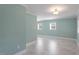 Spacious living room with great natural light, and beautiful hard surface flooring at 112 Celeste Cir, Chapel Hill, NC 27517