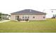 Spacious backyard with an inviting patio and outdoor seating, perfect for entertaining at 117 Oak Rise Ln, Fuquay Varina, NC 27526