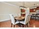 Dining area with a wooden table and upholstered chairs at 117 Oak Rise Ln, Fuquay Varina, NC 27526