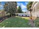 Lush backyard with privacy fence and manicured landscaping at 12404 Beauvoir St, Raleigh, NC 27614