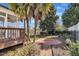 Backyard with tropical landscaping and a paver patio at 12404 Beauvoir St, Raleigh, NC 27614